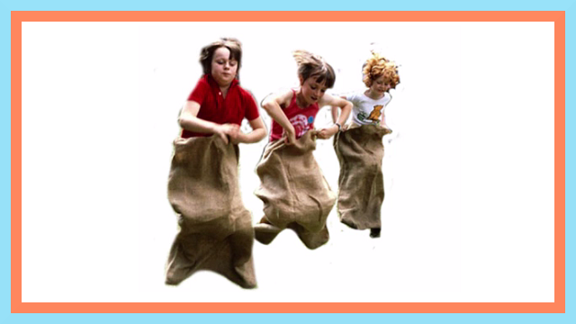 children in potato sack race