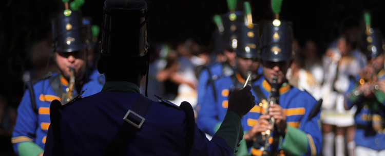 Image of drum major leading a marching band